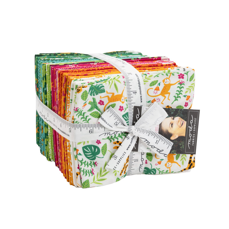 Set of colorful fabric squares with a ruler and brand label on a white background