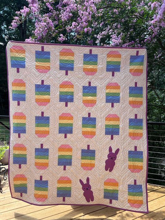 Rainbow Popsicle quilt with purple bunnies