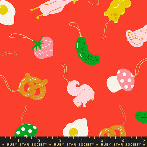 Pattern of food items on a red background with a ruler at the bottom.