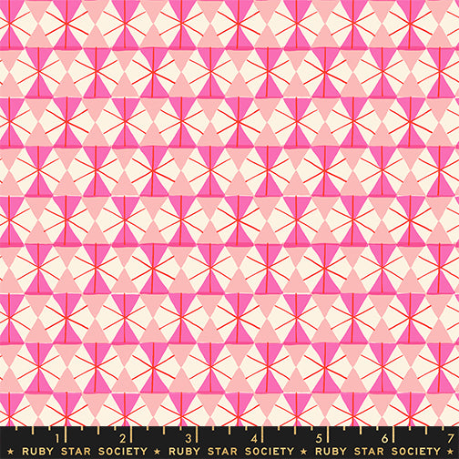 Geometric pattern fabric with pink and red triangles on a white background, featuring Ruby Star Society label.